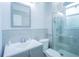 Clean bathroom with a walk-in shower and gray vanity at 8100 Fan Palm Way, Kissimmee, FL 34747