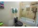 Modern bathroom with a glass shower and tile flooring at 8100 Fan Palm Way, Kissimmee, FL 34747