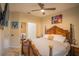 Bedroom with large bed and view of another room at 8100 Fan Palm Way, Kissimmee, FL 34747