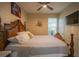 Bedroom with ceiling fan and a comfortable bed at 8100 Fan Palm Way, Kissimmee, FL 34747