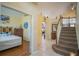 Entryway with view of bedroom and stairs at 8100 Fan Palm Way, Kissimmee, FL 34747