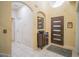 Bright entryway with tile floors and storage at 8100 Fan Palm Way, Kissimmee, FL 34747