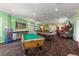 Game room with pool table, ping pong, and arcade games at 8100 Fan Palm Way, Kissimmee, FL 34747