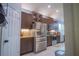 Modern kitchen with stainless steel appliances at 8100 Fan Palm Way, Kissimmee, FL 34747
