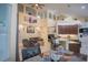 Open living area with high ceilings and a view of the kitchen at 8100 Fan Palm Way, Kissimmee, FL 34747