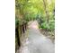 Paved nature trail with wooden bridge at 10 Moree Loop # 13, Winter Springs, FL 32708