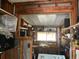 Workshop with tools, shelves, and a workbench at 10470 Sw 99Th Ct, Ocala, FL 34481