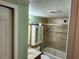 Second bathroom with shower/tub combo and a vanity at 108 Scottsdale Sq # 108, Winter Park, FL 32792