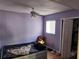 Small bedroom with air conditioner, window, and closet at 108 Scottsdale Sq # 108, Winter Park, FL 32792