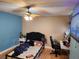 Bedroom with a double bed, a dresser, and a desk with chair at 108 Scottsdale Sq # 108, Winter Park, FL 32792