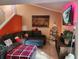 Living Room with L-shaped sofa, ottoman, and a Christmas tree at 108 Scottsdale Sq # 108, Winter Park, FL 32792