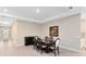 Bright dining room with a formal table and chairs, hardwood floors, and recessed lighting at 1277 Waterview Ridge Cir, Apopka, FL 32703