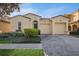 Beautiful 2-story house with a 2 car garage, paver driveway and well manicured landscaping at 1415 Caring Ct, Maitland, FL 32751