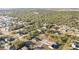 Aerial view of a residential neighborhood with houses and lots at 1609 Pickerel Ct, Kissimmee, FL 34759
