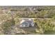 Aerial view of house and surrounding neighborhood at 1609 Pickerel Ct, Kissimmee, FL 34759