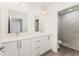 Modern bathroom with double vanity and marble shower at 1609 Pickerel Ct, Kissimmee, FL 34759