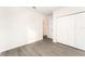 Bright bedroom with vinyl flooring and double door closet at 1609 Pickerel Ct, Kissimmee, FL 34759