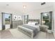 Main bedroom with wood-look flooring and stylish decor at 1609 Pickerel Ct, Kissimmee, FL 34759