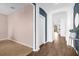 Neutral-toned entry hall with herringbone flooring and two-toned walls at 2271 Rush Bay Way, Orlando, FL 32824