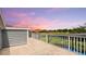 Spacious balcony overlooking backyard and pool at 2377 Victoria Dr, Davenport, FL 33837