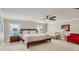 Spacious Primary bedroom with king-size bed and ceiling fan at 2377 Victoria Dr, Davenport, FL 33837