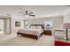 Large bedroom with king-size bed and ceiling fan at 2377 Victoria Dr, Davenport, FL 33837
