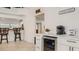 Convenient coffee bar with a wine cooler and coffee maker at 2377 Victoria Dr, Davenport, FL 33837