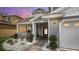Inviting front entrance with a porch, walkway, and landscaping at 2377 Victoria Dr, Davenport, FL 33837