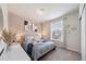 Comfortable bedroom with neutral color scheme and plenty of natural light at 4250 Lana Ave, Davenport, FL 33897