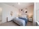 Spacious bedroom with a modern dresser and large window at 4250 Lana Ave, Davenport, FL 33897