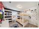 bedroom with bunk beds, Disney decor, and a desk at 4250 Lana Ave, Davenport, FL 33897