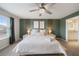 Spacious bedroom with a king-size bed and en-suite bathroom at 4250 Lana Ave, Davenport, FL 33897