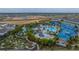 Large community pool with water features and a playground at 4250 Lana Ave, Davenport, FL 33897