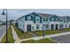 View of townhome with street and walkway access at 4250 Lana Ave, Davenport, FL 33897