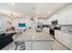 Spacious kitchen with granite island and stainless steel appliances at 4250 Lana Ave, Davenport, FL 33897