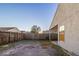 Fenced backyard with patio and grassy area at 5436 Wood Crossing St, Orlando, FL 32811