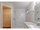 Modern bathroom with granite vanity and tiled shower at 5436 Wood Crossing St, Orlando, FL 32811