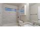 Clean bathroom with granite vanity and bathtub at 5436 Wood Crossing St, Orlando, FL 32811
