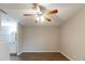 Simple bedroom with ceiling fan and vinyl flooring at 5436 Wood Crossing St, Orlando, FL 32811