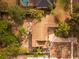 Top-down view of the house, showing the roofline, yard, and driveway at 5509 Bay Lagoon Cir, Orlando, FL 32819