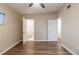 Bedroom with wood floors and access to bathroom at 5815 Harrington Dr, Orlando, FL 32808