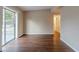 Spacious living area with wood floors and lots of natural light at 5815 Harrington Dr, Orlando, FL 32808