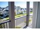 Private balcony overlooking community with street view at 7493 Estuary Lake Loop, Kissimmee, FL 34747