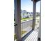 Private balcony overlooking community with street view at 7493 Estuary Lake Loop, Kissimmee, FL 34747