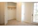 Bedroom with walk-in closet and private balcony access at 7493 Estuary Lake Loop, Kissimmee, FL 34747