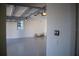 Spacious two-car garage with high ceilings and ample storage space at 7493 Estuary Lake Loop, Kissimmee, FL 34747
