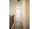 Bright hallway with door to bedroom and balcony access at 7493 Estuary Lake Loop, Kissimmee, FL 34747
