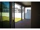 Covered patio with access to backyard, brick flooring and sliding glass doors at 7493 Estuary Lake Loop, Kissimmee, FL 34747
