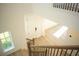 Elegant staircase leading to upper level with hardwood flooring at 7493 Estuary Lake Loop, Kissimmee, FL 34747