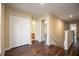 Upstairs hallway with double door closet and bathroom access at 11520 Robbyes Dr, Orlando, FL 32817